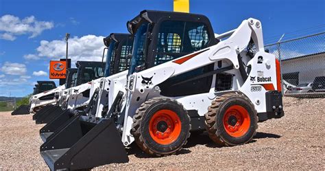 ram 1500 pulling skid steer|Pulling skidder and excavator .